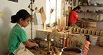 Giannis' son, Simos while learning the pottery art with his father